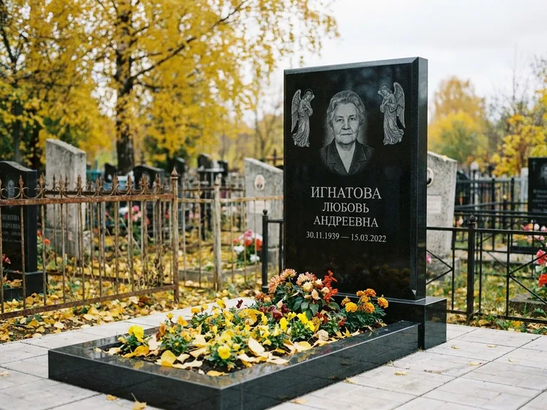 Памятник с гравировкой ангела — гравировка двух ангелов по сторонам портрета, работа «Игнатова» в Краснодаре