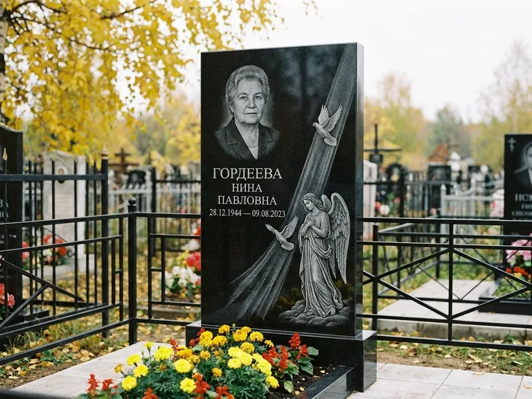 Памятник с гравировкой ангела — гравировка ангела с голубем по диагонали стелы, работа «Гордеева» в Краснодаре