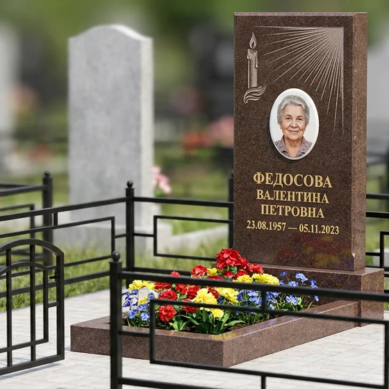 Памятник с резной свечой из дымовского гранита с портретом
